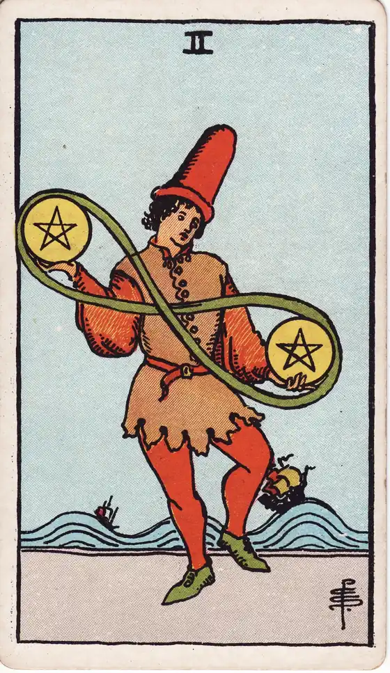 Dos de Oros, carta del tarot Rider-Waite-Smith