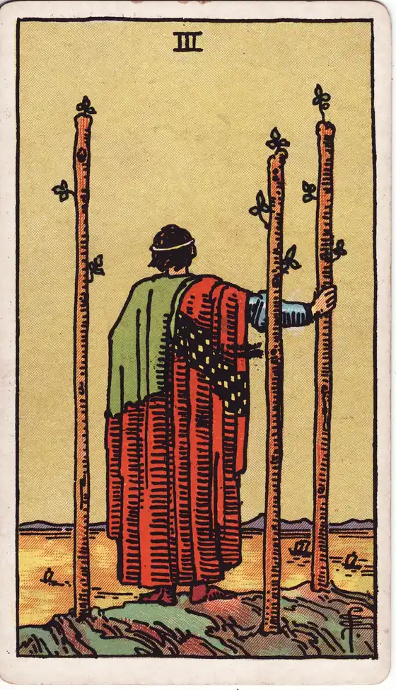 Tres de Bastos, carta del tarot Rider-Waite-Smith